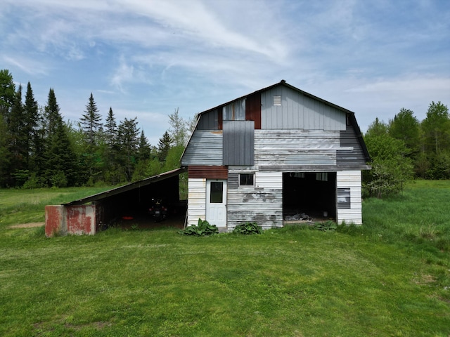 view of outdoor structure with a lawn