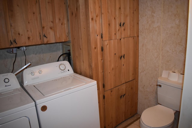 laundry room featuring washing machine and dryer