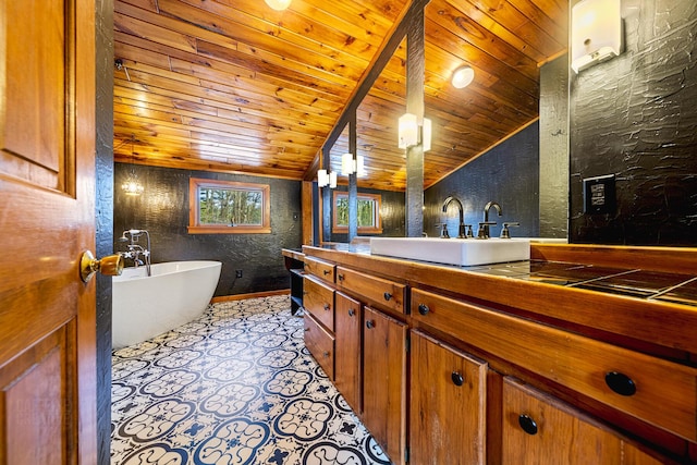 bathroom featuring a tub to relax in, wooden ceiling, vaulted ceiling, and vanity