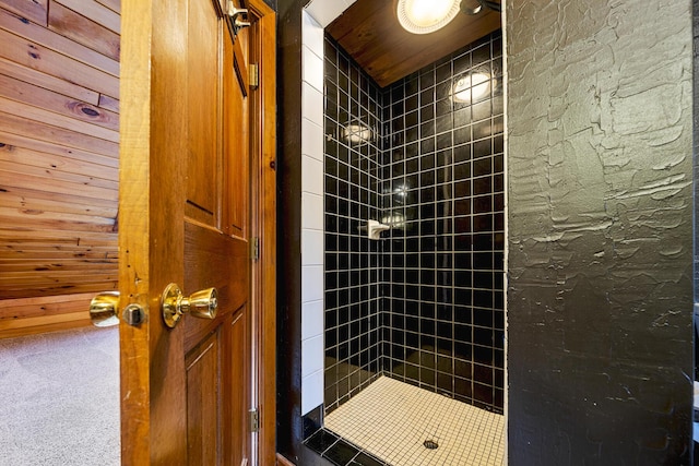 bathroom with tiled shower