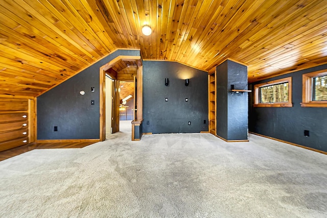 bonus room with wooden ceiling, lofted ceiling, and carpet flooring