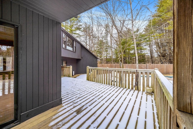 view of snow covered deck