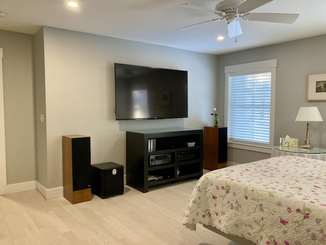 bedroom featuring ceiling fan and light hardwood / wood-style floors