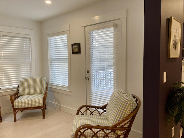 sitting room featuring light wood-type flooring