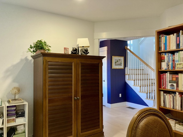 hallway featuring light wood-type flooring