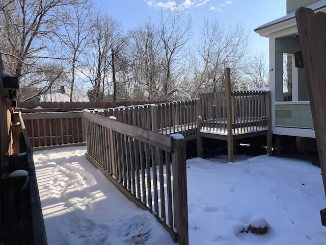 view of snow covered deck