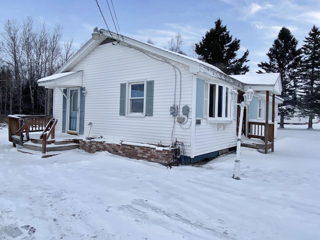 view of snow covered property