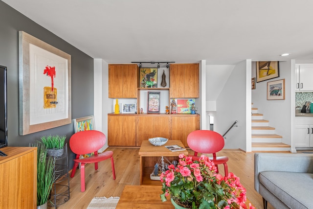 playroom featuring light wood-type flooring