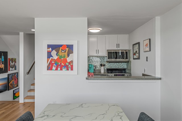 bedroom featuring light wood-type flooring