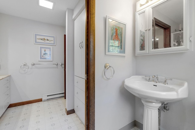 bathroom with baseboard heating