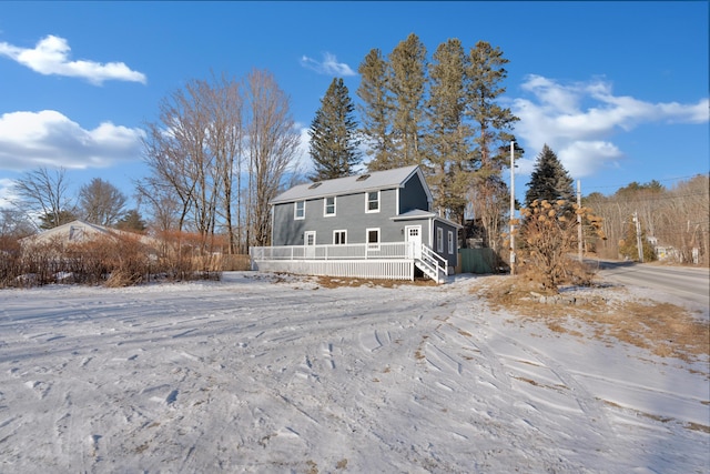 view of front of house featuring a wooden deck