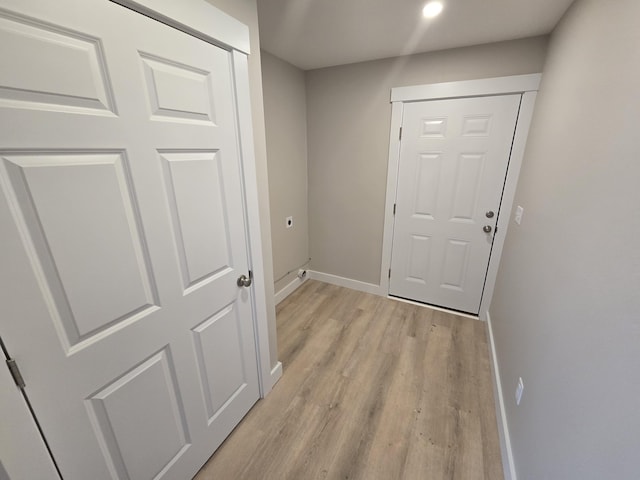 entryway with light hardwood / wood-style flooring