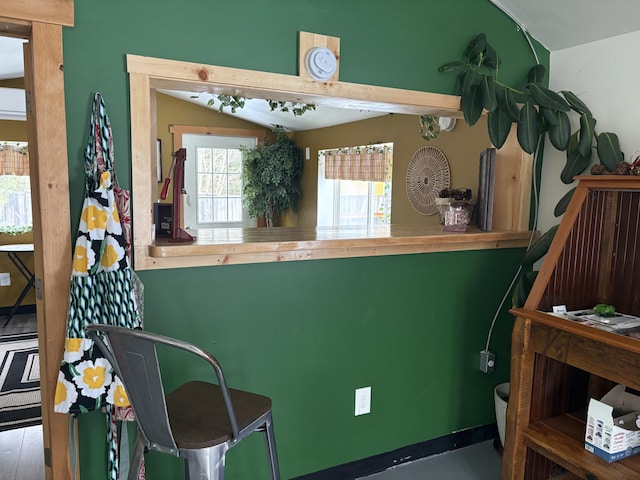 interior space featuring vaulted ceiling