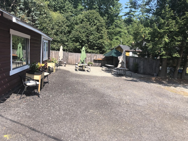 view of patio featuring an outdoor fire pit