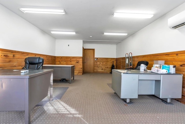 home office with wood walls and a wall unit AC