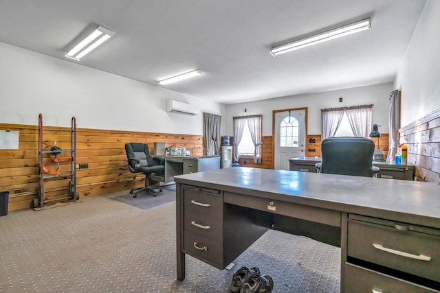 office space with a wall mounted air conditioner and wooden walls