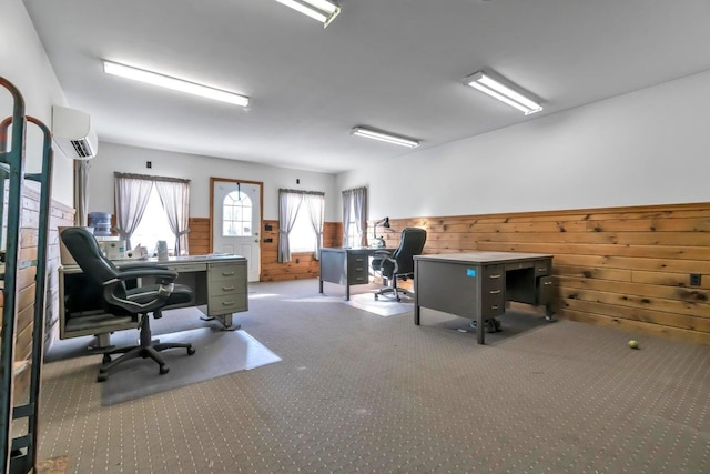 carpeted home office with a wall mounted AC and wood walls