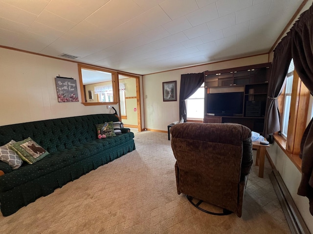 living room with light colored carpet and crown molding