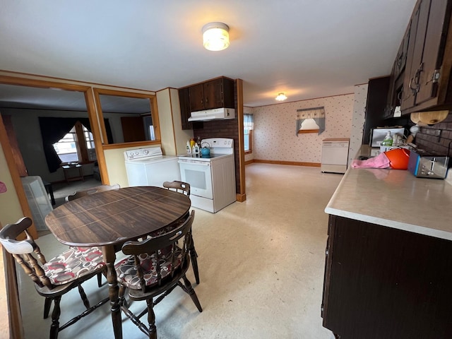 dining space featuring independent washer and dryer