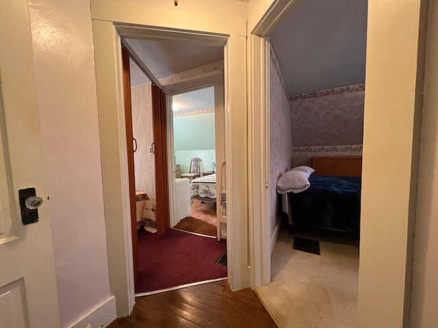 corridor with dark wood-type flooring