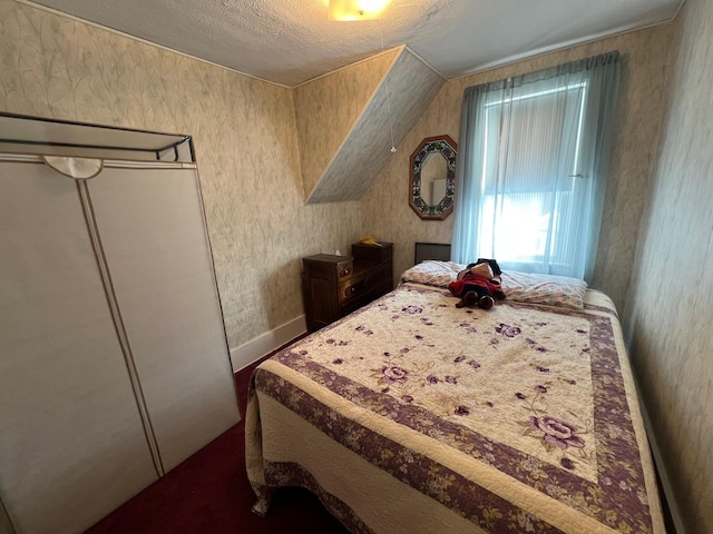 bedroom featuring a textured ceiling