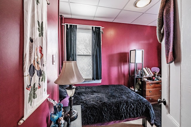 bedroom featuring a drop ceiling