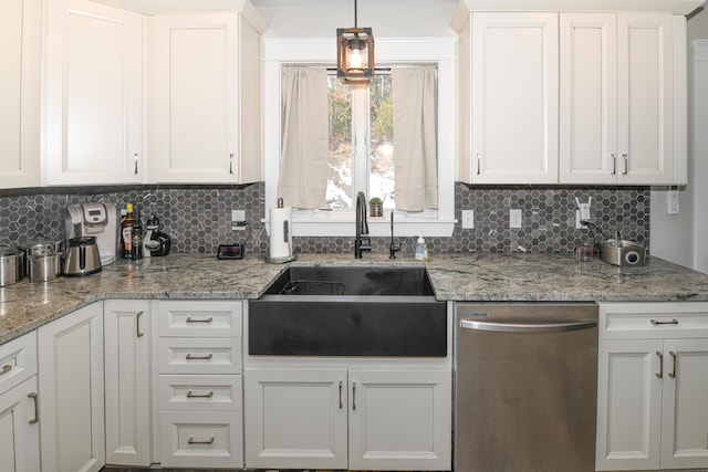 kitchen with stainless steel dishwasher, decorative light fixtures, and white cabinetry