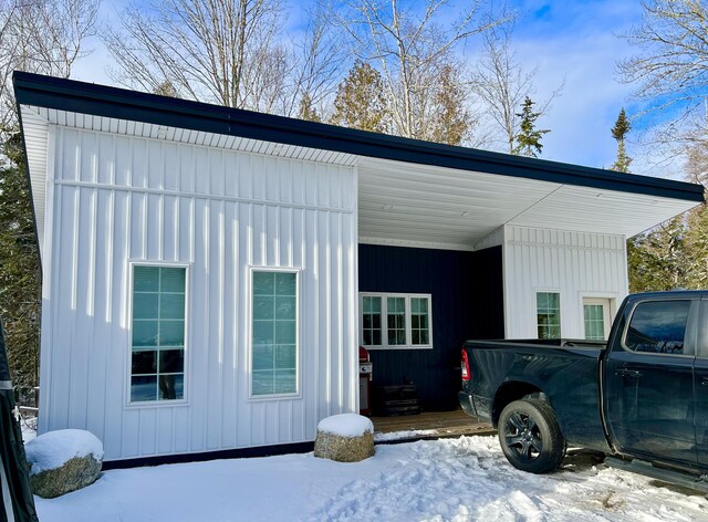 view of snow covered property