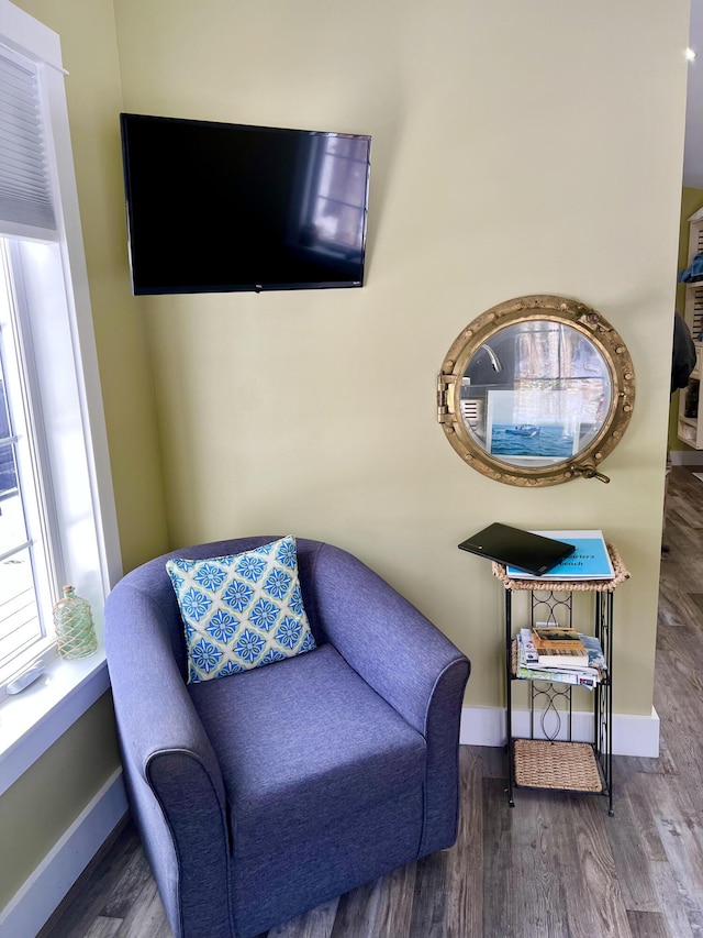 sitting room featuring hardwood / wood-style flooring