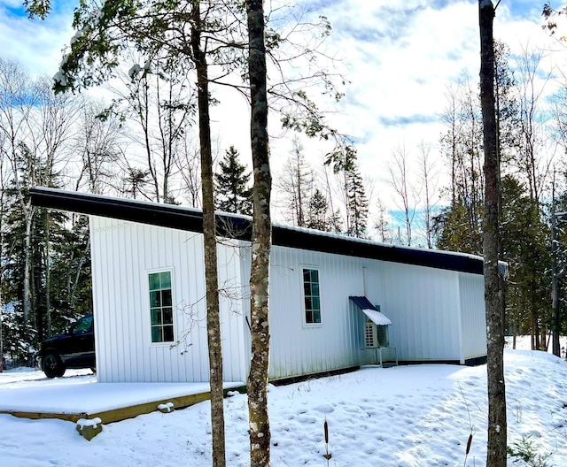 view of snow covered property