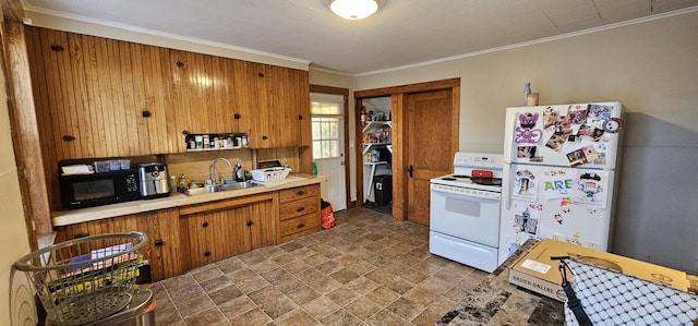 kitchen featuring crown molding, sink, and white appliances