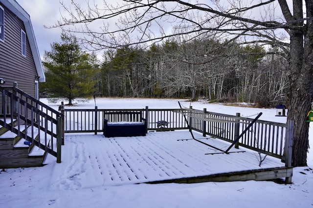 view of snow covered deck