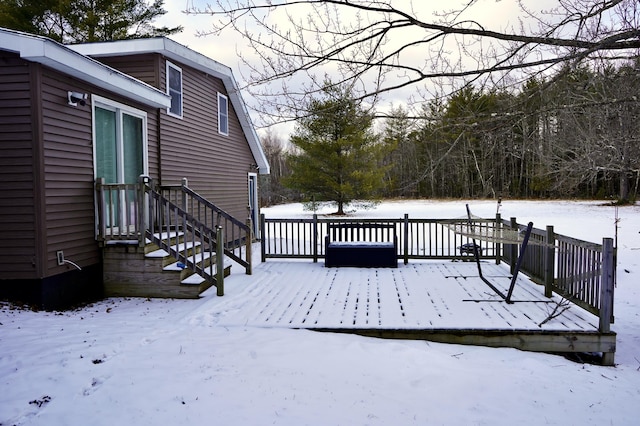 view of snow covered deck