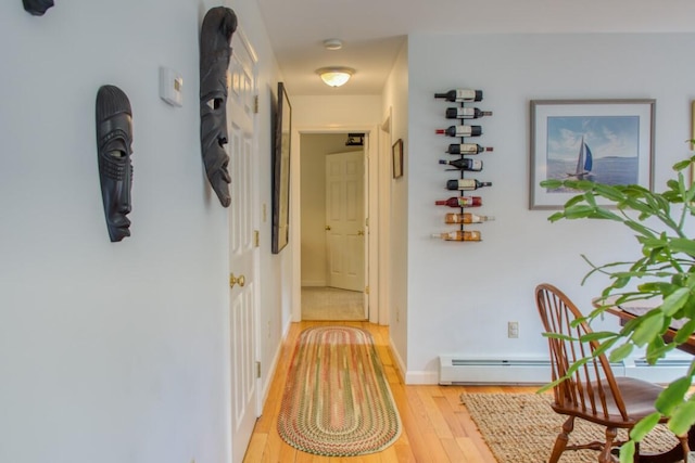 hallway featuring light hardwood / wood-style flooring