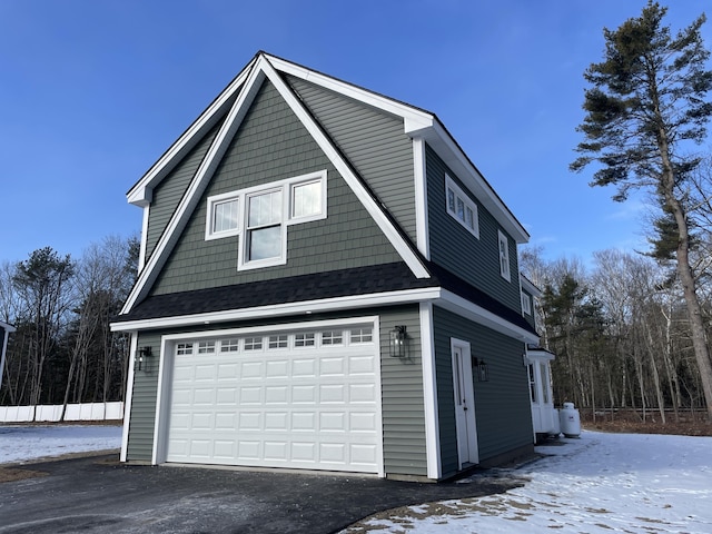 view of snow covered garage