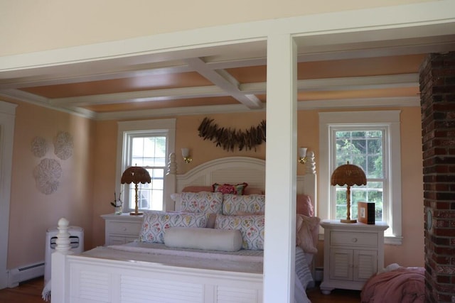 bedroom with beamed ceiling, a baseboard heating unit, and dark hardwood / wood-style floors