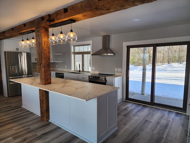 61 Hathaway Hill Rd, Livermore, ME 04253 - kitchen featuring appliances with stainless steel finishes, wall chimney exhaust hood, dark wood-type flooring, plenty of natural light, and beamed ceiling
