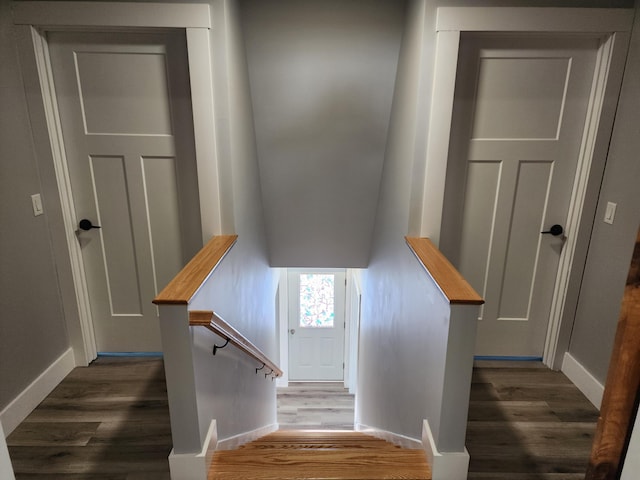 61 Hathaway Hill Rd, Livermore, ME 04253 - staircase featuring wood finished floors and baseboards