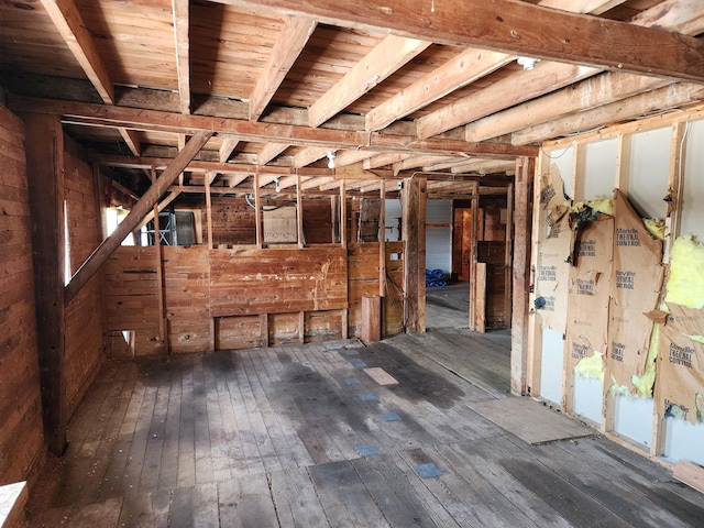 61 Hathaway Hill Rd, Livermore, ME 04253 - miscellaneous room with hardwood / wood-style flooring and wood walls