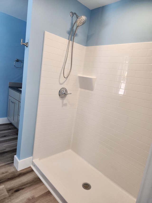 61 Hathaway Hill Rd, Livermore, ME 04253 - full bath with tiled shower and wood finished floors