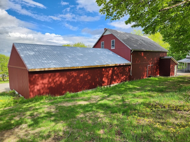 61 Hathaway Hill Rd, Livermore, ME 04253 - view of pole building featuring a lawn