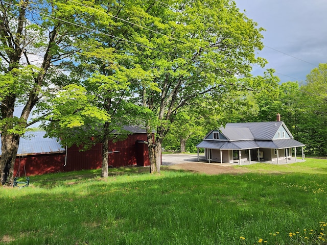 61 Hathaway Hill Rd, Livermore, ME 04253 - view of grassy yard featuring an outbuilding