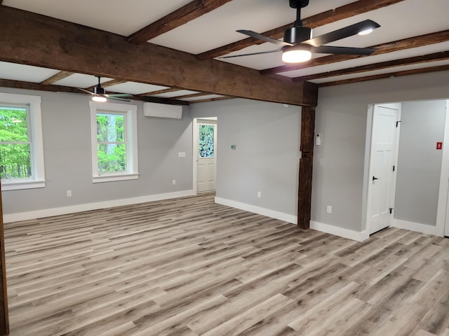 61 Hathaway Hill Rd, Livermore, ME 04253 - empty room with ceiling fan, wood finished floors, beamed ceiling, and baseboards