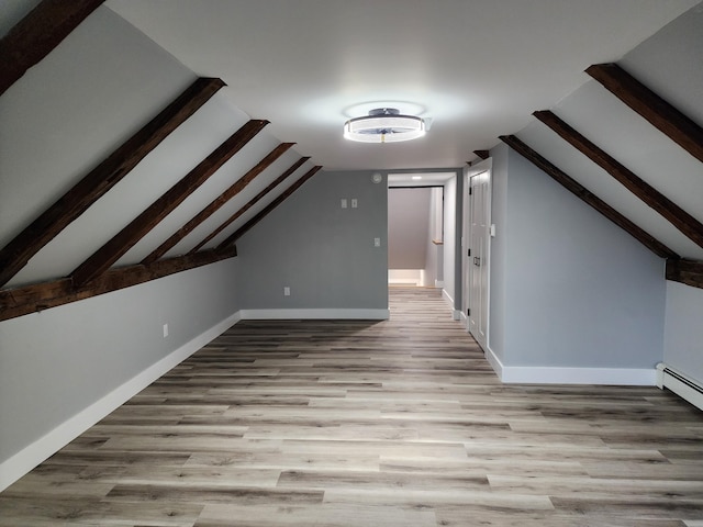 61 Hathaway Hill Rd, Livermore, ME 04253 - additional living space with baseboards, wood finished floors, and stairs