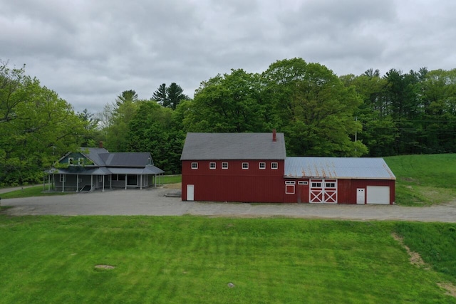 61 Hathaway Hill Rd, Livermore, ME 04253 - view of front of property featuring a front yard and an outbuilding