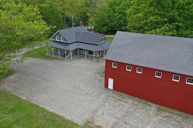 61 Hathaway Hill Rd, Livermore, ME 04253 - aerial view of property and surrounding area featuring a heavily wooded area