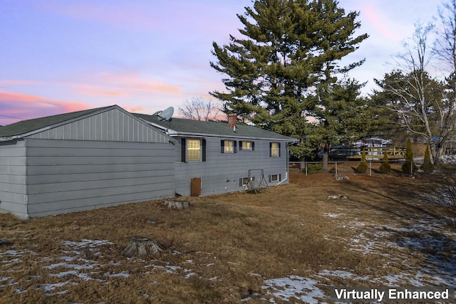 view of property exterior at dusk