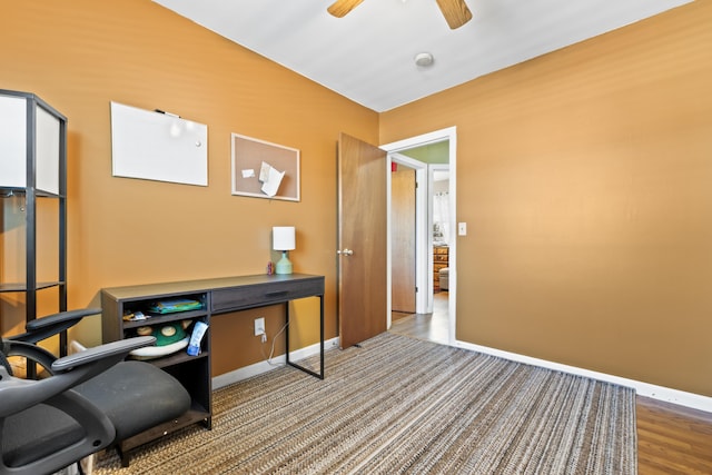 home office with ceiling fan and hardwood / wood-style flooring