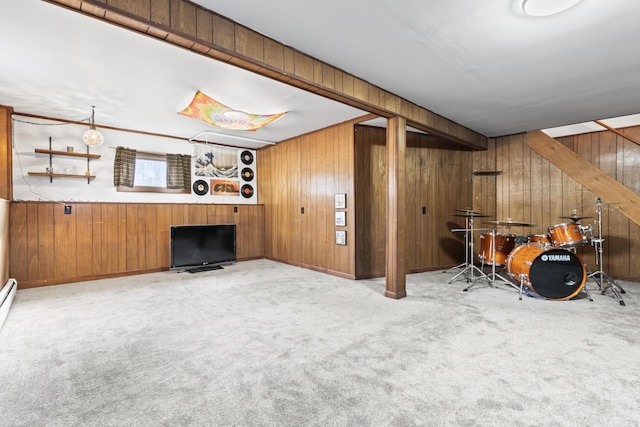 basement with wooden walls and light carpet