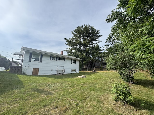 7 Meadow Ln, Lewiston, ME 04240 - back of property with a chimney